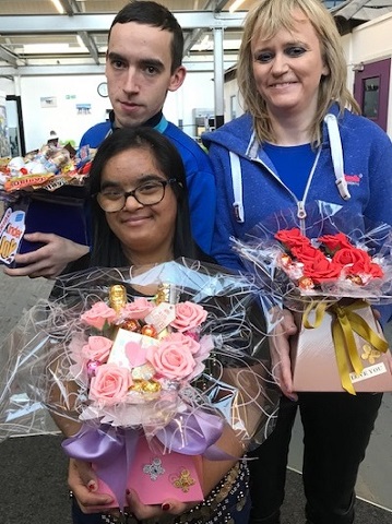 Pictured with the bouquets are Waves members Ryan and Alice with Sabrina at the front.
